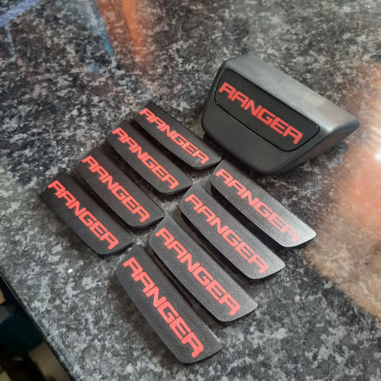 8 Ford Ranger End Caps on a Table