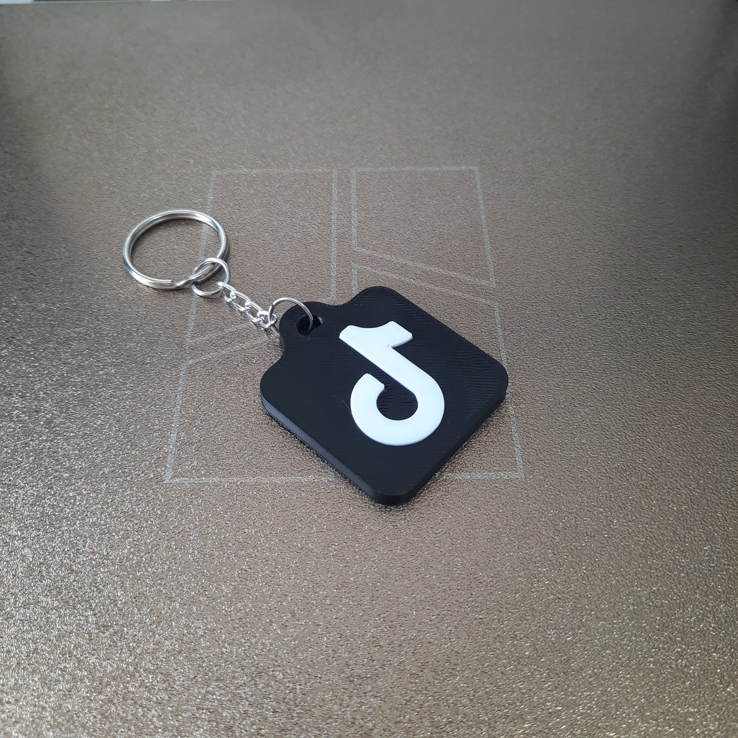 Front of Tiktok NFC keychain