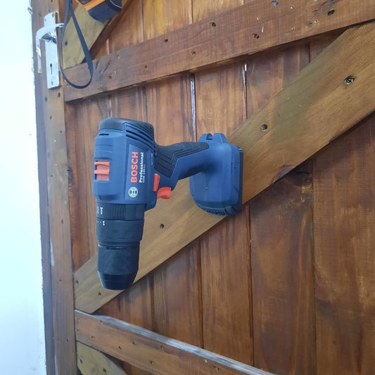 Bosch power drill on a wooden surface