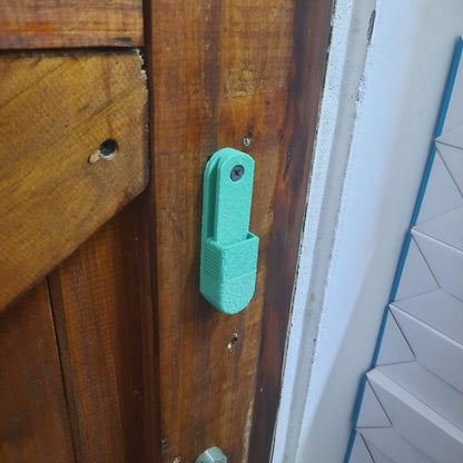 Green fishing reel wall mount