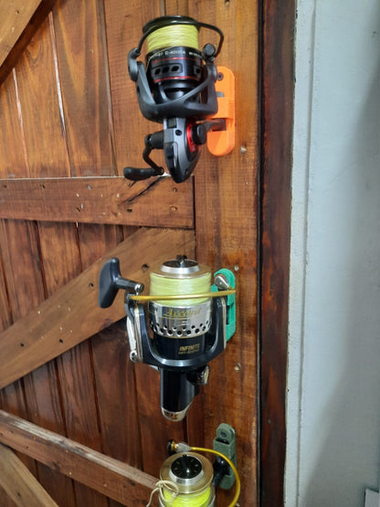 Fishing reels mounted on a wooden door