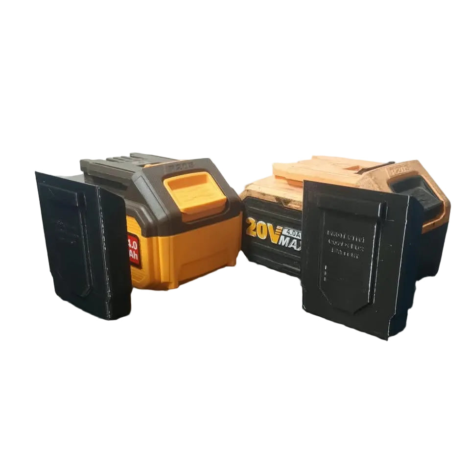 2 INGCO 20v batteries with dust covers next to them
